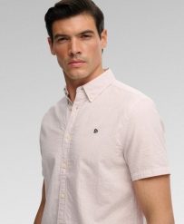 Superdry Klasyczna koszula seersucker z krótkim rękawem — 100% bawełna. Białe koszule damskie Superdry., na lato, l, bez wzorów, z bawełny, klasyczne, bez kołnierzyka, bez ramiączek. Za 282.85 zł.
