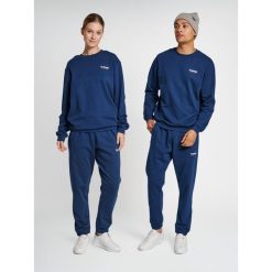 Bluza Hummel LGC Austin. Niebieskie bluzy sportowe damskie HUMMEL, bez wzorów, bez ramiączek, bez kaptura. W wyprzedaży za 176.65 zł.