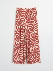 Wiskozowe spodnie wide leg z abstrakcyjnym wzorem - żółty. Żółte spodnie materiałowe damskie Sinsay, bez wzorów, z wiskozy. Za 39.99 zł.