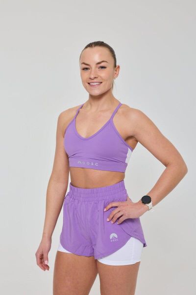 Biustonosz sportowy Infinite ze średnim podtrzymaniem - fioletowy. Fioletowe biustonosze sportowe damskie OOSC, bez wzorów, z materiału. Za 147.99 zł.