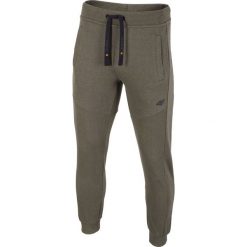 Spodnie dresowe męskie SPMD002 - khaki melanż. Brązowe spodnie dresowe męskie 4f, bez wzorów, z dresówki. W wyprzedaży za 69.99 zł.