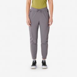 Spodnie turystyczne damskie Quechua MH500 Light. Fioletowe spodnie materiałowe damskie QUECHUA, bez wzorów, z elastanu, eleganckie. W wyprzedaży za 99.99 zł.