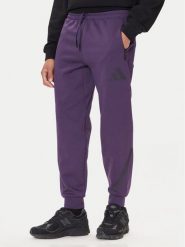 Adidas Spodnie dresowe Z.N.E. JW4726 Fioletowy Loose Fit. Fioletowe spodnie dresowe męskie Adidas, bez wzorów, z dresówki. Za 339.99 zł.