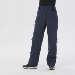Spodnie narciarskie damskie Wedze FR500. Niebieskie spodnie dresowe damskie WED'ZE, bez wzorów, z materiału, sportowe. Za 449.99 zł.