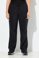 Damskie Spodnie dresowe zaszewki szerokie nogawki elastyczny pas. Czarne spodnie sportowe damskie Ulla Popken, plus size, z bawełny. Za 239.99 zł.