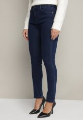 Granatowe Jeansy o Fasonie Slim z Regularnym Stanem Zelzedis. Niebieskie jeansy damskie Born2be. Za 24.99 zł.