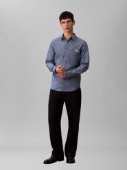 Calvin Klein Jeans koszula casual Mężczyźni Regular Fit Bawełna niebieski, L. Niebieskie koszule męskie Calvin Klein Jeans, l, bez wzorów, z bawełny, bez kołnierzyka, bez ramiączek. Za 179.95 zł.