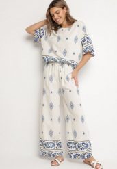 Beżowo-Niebieski Wiskozowy Komplet w Stylu Boho Szerokie Spodnie i Bluzka T-shirt Sarilorae. Niebieskie spodnie materiałowe damskie Born2be, bez wzorów, z wiskozy, boho. Za 84.99 zł.