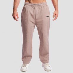 Spodnie męskie fitness oversize Aura. Brązowe spodnie sportowe męskie GYMBEAM, z bawełny. Za 139.90 zł.