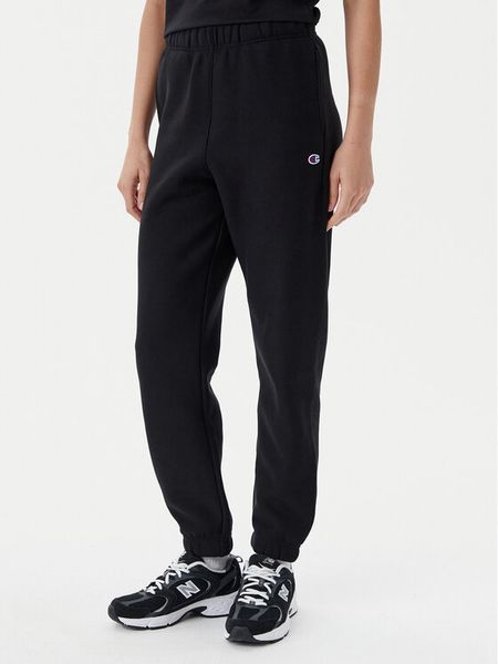 Champion Spodnie dresowe 117872 Czarny Slim Fit. Czarne spodnie dresowe damskie CHAMPION, m, bez wzorów, z bawełny. Za 209.99 zł.