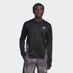 Bluza z blokami kolorów adidas Own the Run. Czarne bluzy bez kaptura męskie Adidas, s. W wyprzedaży za 160.60 zł.