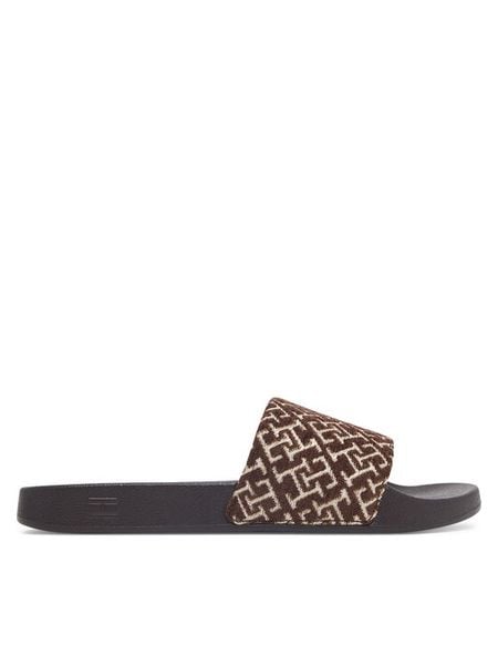 Tommy Hilfiger Klapki Th Monogram Pool Slide FW0FW09611 Brązowy. Brązowe klapki damskie Tommy Hilfiger, bez wzorów, z materiału, bez obcasa. Za 169.99 zł.