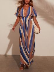 Milan Kiss Sukienka w kolorze jasnobrązowo-niebiesko-beżowym rozmiar: L. Brązowe sukienki damskie Milan Kiss, l, bez wzorów, z wiskozy, bez kołnierzyka, bez ramiączek, maxi. Za 173.99 zł.