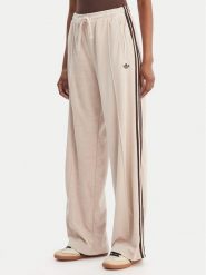 Adidas Spodnie dresowe Terry Towel Firebird KQ6661 Beżowy Loose Fit. Brązowe spodnie dresowe damskie Adidas, s, bez wzorów, z bawełny. Za 339.99 zł.