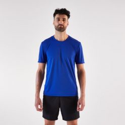 Koszulka do biegania męska Kiprun Run 100. Niebieskie t-shirty sportowe męskie KIPRUN, m, z materiału, bez ramiączek, do biegania. Za 29.99 zł.