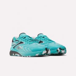Damskie buty treningowe Reebok NANO X5 EDGE 100272190 turkusowe. Niebieskie obuwie treningowe damskie Reebok, na fitness i siłownię. Za 539.00 zł.
