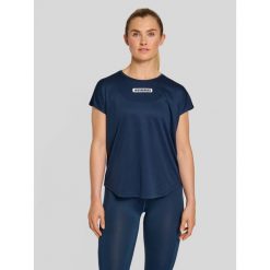 Koszulka damska Hummel TE Tola. Niebieskie bluzki damskie HUMMEL, s, bez wzorów, z tkaniny, bez kołnierzyka. Za 137.00 zł.