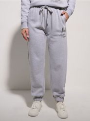 Spodnie jogger Minnie Mouse - szary. Szare spodnie materiałowe damskie Sinsay, bez wzorów. W wyprzedaży za 19.99 zł.