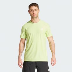 Koszulka Own The Run. Zielone t-shirty sportowe męskie Adidas, l, z materiału, bez ramiączek, do biegania. Za 159.00 zł.
