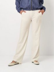 Toni Spodnie w kolorze kremowym rozmiar: W46. Brązowe spodnie materiałowe damskie Toni, bez wzorów, z materiału. Za 152.99 zł.