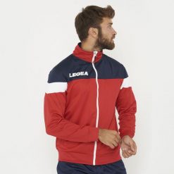 Kurtka sportowa Bolivia czerwona-niebieska. Czerwone kurtki treningowe męskie Legea, m, z aplikacjami, z materiału, na fitness i siłownię. Za 72.00 zł.
