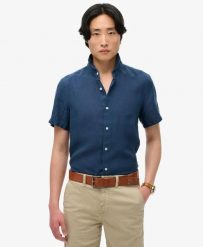 Superdry Vacation Linen S/S Koszula lniana 100% NAVY. Niebieskie koszule męskie Superdry., na lato, m, bez wzorów, bez kołnierzyka, bez ramiączek. Za 277.00 zł.