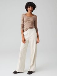 OPUS Spodnie w kolorze kremowym rozmiar: 44. Brązowe spodnie materiałowe damskie Opus, bez wzorów, z materiału, z podwyższonym stanem. Za 143.99 zł.
