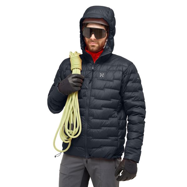 Kurtka z kapturem Haglöfs ROC Flash Down. Czarne kurtki męskie Haglöfs, bez wzorów, z puchu, sportowe, z kapturem. W wyprzedaży za 1,060.30 zł.