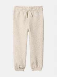 Gap Spodnie dresowe 635490 Écru Regular Fit. Spodnie dziewczęce GAP, z bawełny. Za 69.99 zł.