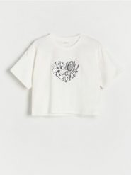 Bawełniany t-shirt z aplikacją - złamana biel. Koszulki dziewczęce Reserved, z aplikacjami, z bawełny, bez ramiączek. W wyprzedaży za 19.99 zł.