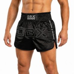 Spodenki tajskie męskie czarne V1 COMBATWEAR DBX Bushido. Czarne szorty sportowe męskie DBX BUSHIDO, l, z żakardem, na fitness i siłownię. Za 239.99 zł.