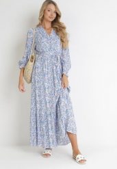 Niebieska Sukienka Maxi z Wiskozy z Gumką w Talii i Materiałowym Paskiem Edeline. Niebieskie sukienki damskie Born2be, na jesień, l, bez wzorów, z materiału, bez kołnierzyka, bez ramiączek, maxi, kopertowe. W wyprzedaży za 127.99 zł.
