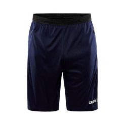 Spodenki treningowe męskie Craft Evolve Zip Pocket. Niebieskie szorty męskie Craft, z materiału, bez kołnierzyka. Za 188.00 zł.