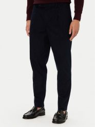 Tommy Hilfiger Spodnie materiałowe MW0MW45058 Granatowy Tapered Fit. Niebieskie spodnie materiałowe męskie Tommy Hilfiger, bez wzorów, z bawełny. Za 569.99 zł.