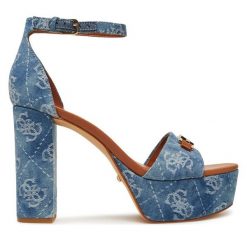 Sandały Guess. Niebieskie sandały damskie Guess, z aplikacjami, bez obcasa, na słupku. Za 599.99 zł.
