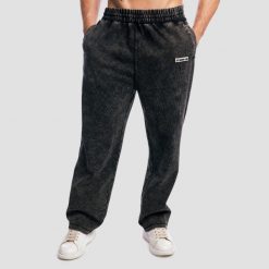 Spodnie dresowe męskie oversize z efektem sprania czarne Aura. Czarne spodnie sportowe męskie GYMBEAM, z bawełny. Za 139.90 zł.