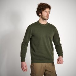 Sweter outdoor Solognac 100. Brązowe swetry męskie SOLOGNAC, l, bez wzorów, z elastanu, bez kołnierzyka. W wyprzedaży za 39.99 zł.