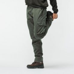 Spodnie myśliwskie 500 Warm wodoodporne. Brązowe spodnie materiałowe męskie SOLOGNAC, bez wzorów, z materiału, sportowe. Za 269.99 zł.