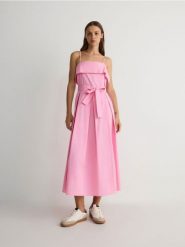 Sukienka z wiązaniem z bawełny - różowy. Czerwone sukienki damskie Reserved, l, bez wzorów, z bawełny, bez kołnierzyka, bez ramiączek, midi, rozkloszowane. W wyprzedaży za 49.99 zł.