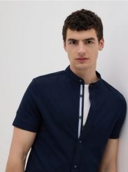 Koszula super slim fit ze stójką - granatowy. Niebieskie koszule męskie Reserved, l, bez wzorów, z bawełny, bez kołnierzyka, bez ramiączek. W wyprzedaży za 59.99 zł.