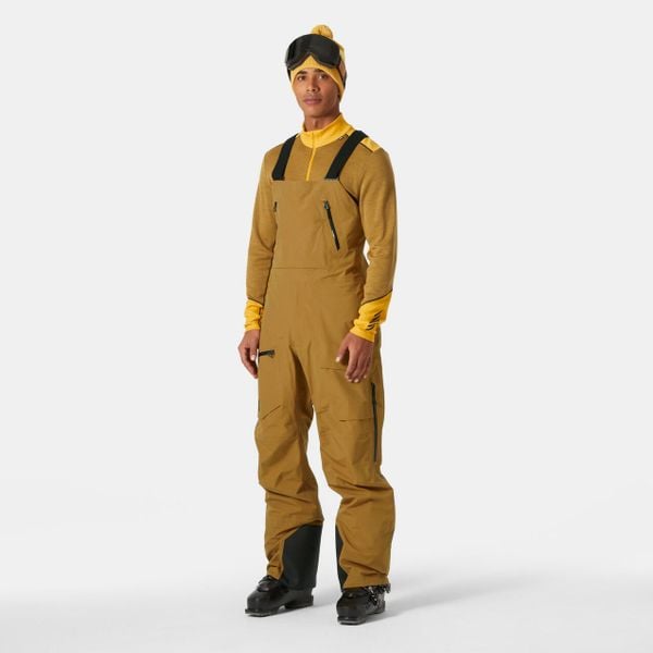 Spodnie narciarskie z szelkami Helly Hansen Ridge Infinity. Brązowe spodnie materiałowe męskie Helly Hansen, bez wzorów, sportowe. W wyprzedaży za 2,381.00 zł.