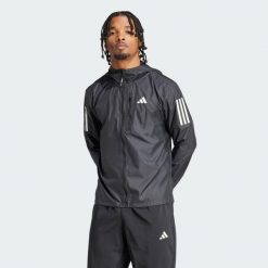 Kurtka Own The Run. Niebieskie kurtki treningowe męskie Adidas, l, bez wzorów, do biegania. Za 349.00 zł.