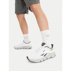Buty do biegania Reebok. Białe obuwie do biegania damskie Reebok. Za 329.99 zł.