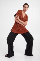 Tunika WOLFORD. Tuniki damskie Wolford, s, bez wzorów, bez kołnierzyka, bez ramiączek. W wyprzedaży za 1,164.87 zł.