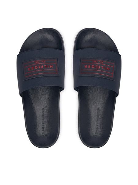 Tommy Hilfiger Klapki Patch Pool Slide FM0FM06008 Granatowy. Niebieskie klapki i japonki męskie Tommy Hilfiger, ze skóry. Za 189.99 zł.