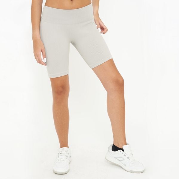 Damskie spodenki kolarskie treningowe RIDE. Szare spodenki sportowe damskie Legea, bez wzorów, z elastanu, sportowe. W wyprzedaży za 76.50 zł.