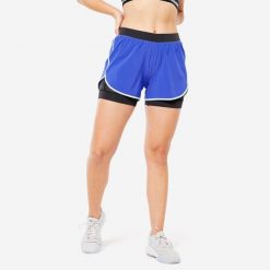 Spodenki fitness cardio damskie Domyos FST 900. Niebieskie spodenki sportowe damskie DOMYOS, bez wzorów, z materiału, sportowe. W wyprzedaży za 59.99 zł.