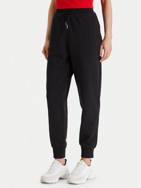 Calvin Klein Jeans Spodnie dresowe Archive Logo LV047E236G Czarny Slim Fit. Czarne jeansy damskie Calvin Klein Jeans, xl, bez wzorów, z bawełny. Za 369.99 zł.