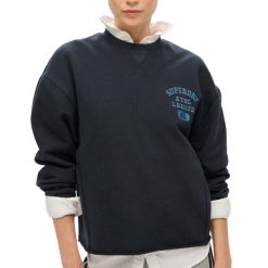Krótki, obszerny sweter sportowy. Niebieskie swetry klasyczne damskie Superdry., xs, z bawełny, bez kołnierzyka. Za 288.20 zł.