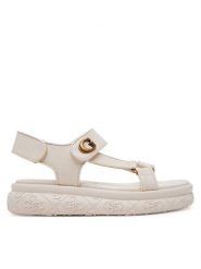 Guess Sandały FLJLAN ELE03 Écru. Sandały damskie Guess, z aplikacjami, ze skóry, bez obcasa, na płaskiej podeszwie. Za 329.99 zł.
